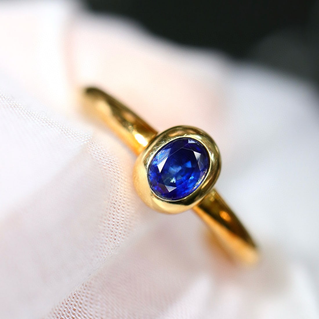 14k Gold 0.3 Ct Natural Sapphire Ring: Ref:231019158 // gold content:14k gold // ring size:7. 25us // // main gemstone:sapphire // shape:oval // carat weight:0. 3ct // color:blue // treatment:natural // Low Estimate: 1200 Condition: New