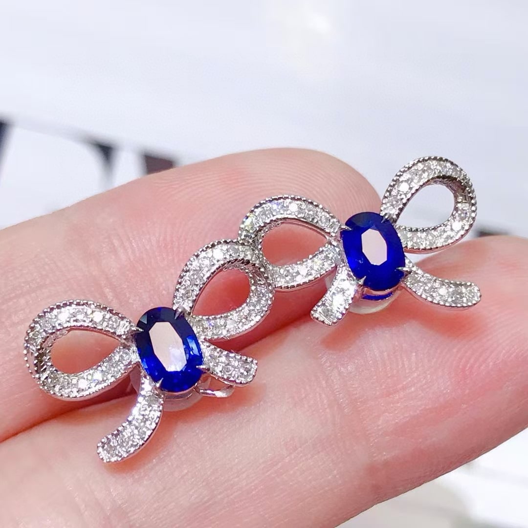 14k Gold 1.48 Ctw Natural Sapphire & Diamond Earrings: Ref:231019162 // gold content:14k gold // main gemstone:sapphire // shape:oval // carat weight:1. 1ct // color:blue // treatment:natural // // adjacent gemstone 2 : diamond // shape:round // carat