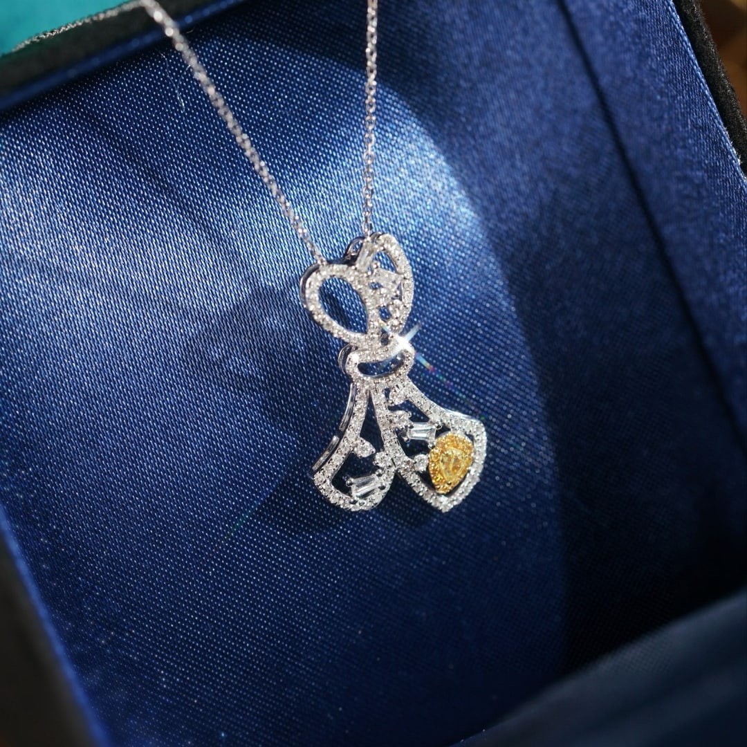 14k Gold 0.65 Ctw Natural Yellow Diamond & Diamond Necklace: Ref:231019164 // gold content:14k gold // main gemstone:yellow diamond // shape:pear // carat weight:0. 1ct // color:yellow // treatment:natural // // adjacent gemstone 2 : diamond // shape:multiply