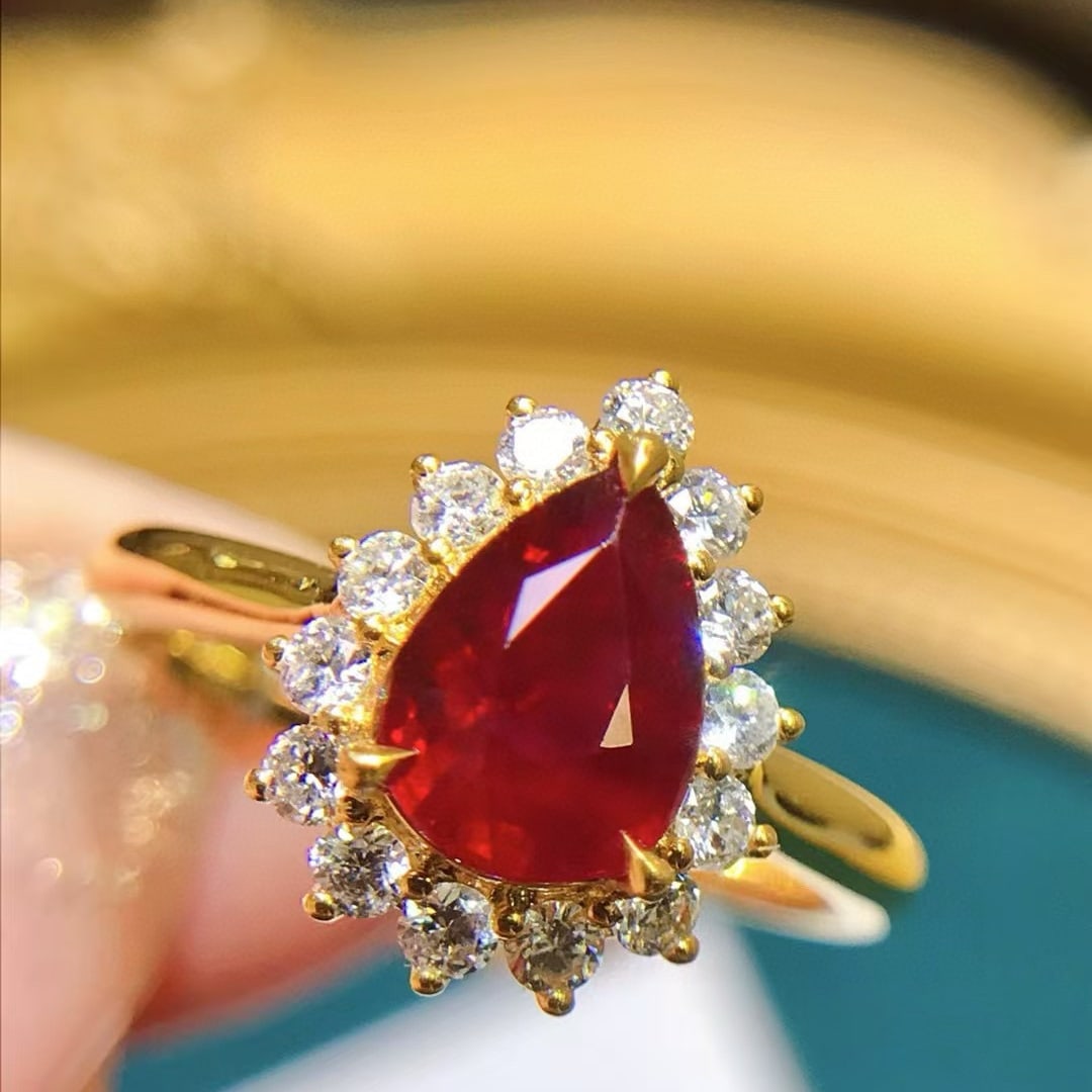 14k Gold 2.12 Ctw Natural Ruby & Diamond Ring: Ref:231019185 // gold content:14k gold // ring size:7. 25us // // main gemstone:ruby // shape:pear // carat weight:1. 6ct // color:red // treatment:natural // // adjacent gemstone 2 : diamond // shape