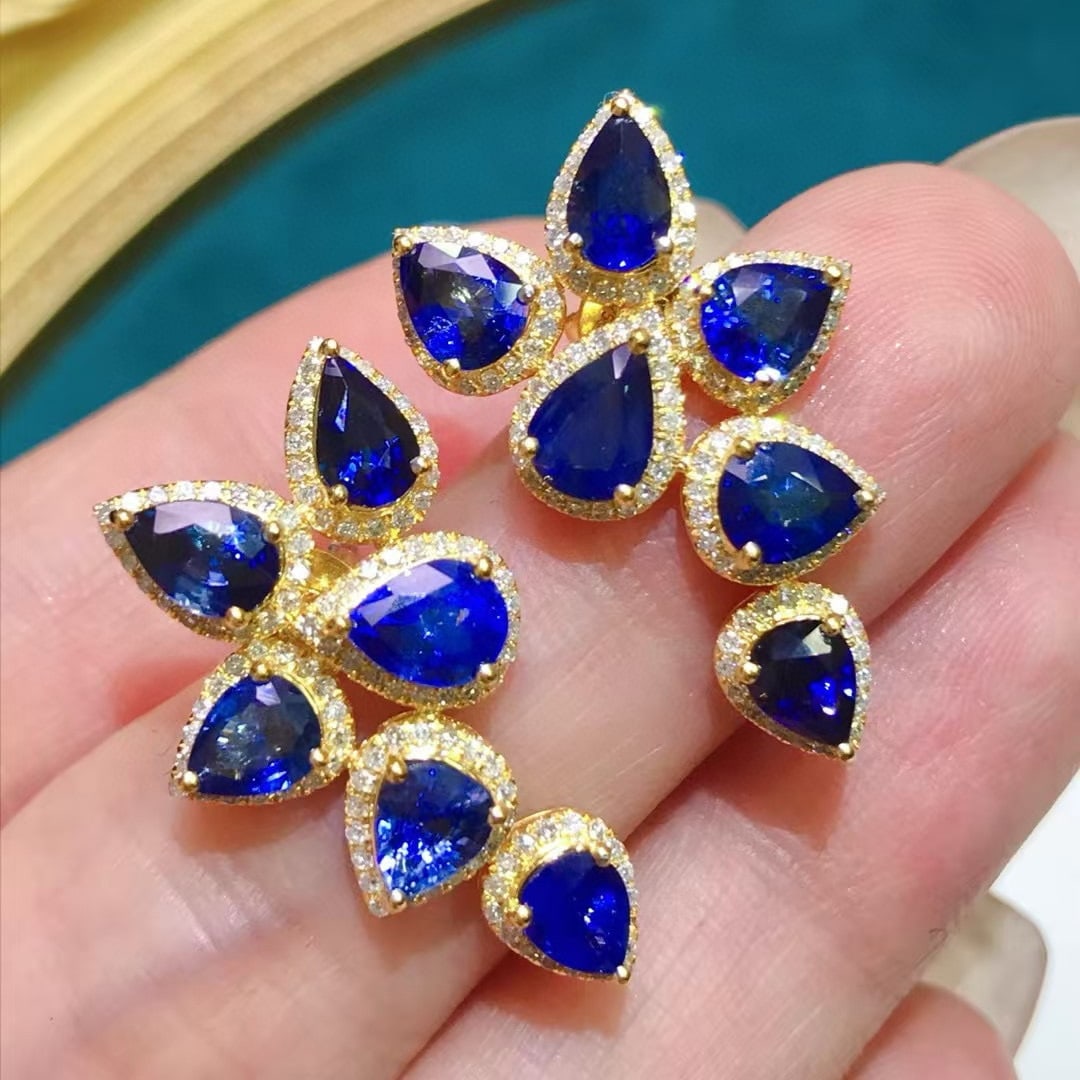 14k Gold 6.37 Ctw Natural Sapphire & Diamond Earrings: Ref:231019187 // gold content:14k gold // main gemstone:sapphire // shape:pear // carat weight:5. 7ct // color:blue // treatment:natural // // adjacent gemstone 2 : diamond // shape:round // carat