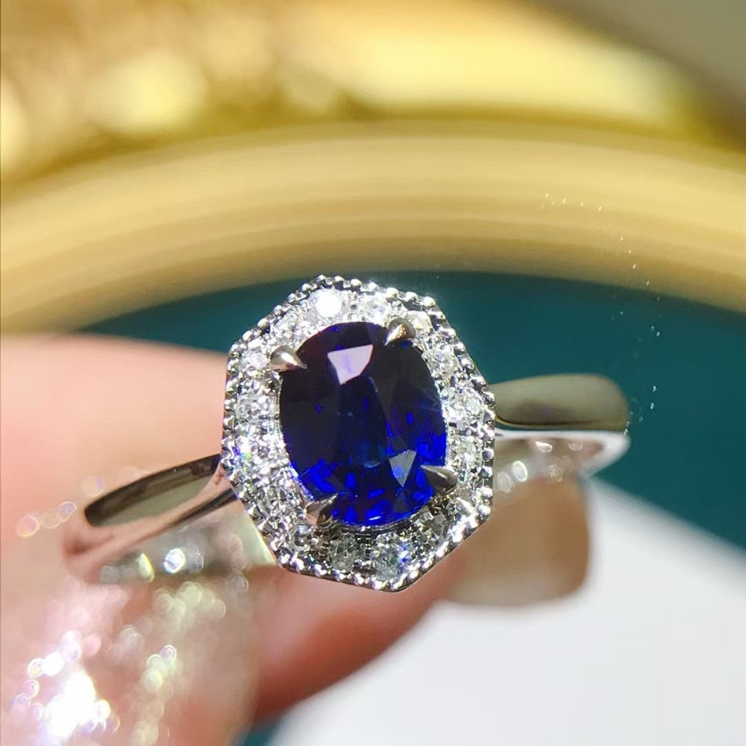 14k Gold 0.84 Ctw Natural Sapphire & Diamond Ring: Ref:231019189 // gold content:14k gold // ring size:7. 25us // // main gemstone:sapphire // shape:oval // carat weight:0. 74ct // color:blue // treatment:natural // // adjacent gemstone 2 : diamond
