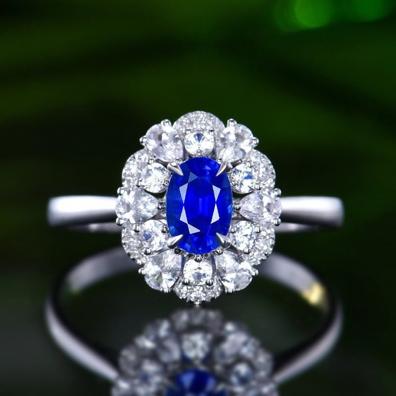 14k Gold 0.70 Ctw Natural Sapphire & Diamond Ring: Ref:231019220 // gold content:14k gold // ring size:7. 25us // // main gemstone:sapphire // shape:oval // carat weight:0. 65ct // color:blue // treatment:natural // // adjacent gemstone 2 : diamond