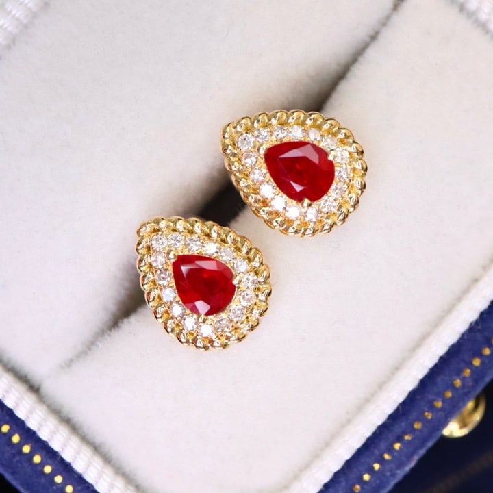 14k Gold 0.74 Ctw Natural Ruby & Diamond Earrings: Ref:231019222 // gold content:14k gold // main gemstone:ruby // shape:pear // carat weight:0. 59ct // color:red // treatment:natural // // adjacent gemstone 2 : diamond // shape:round // carat