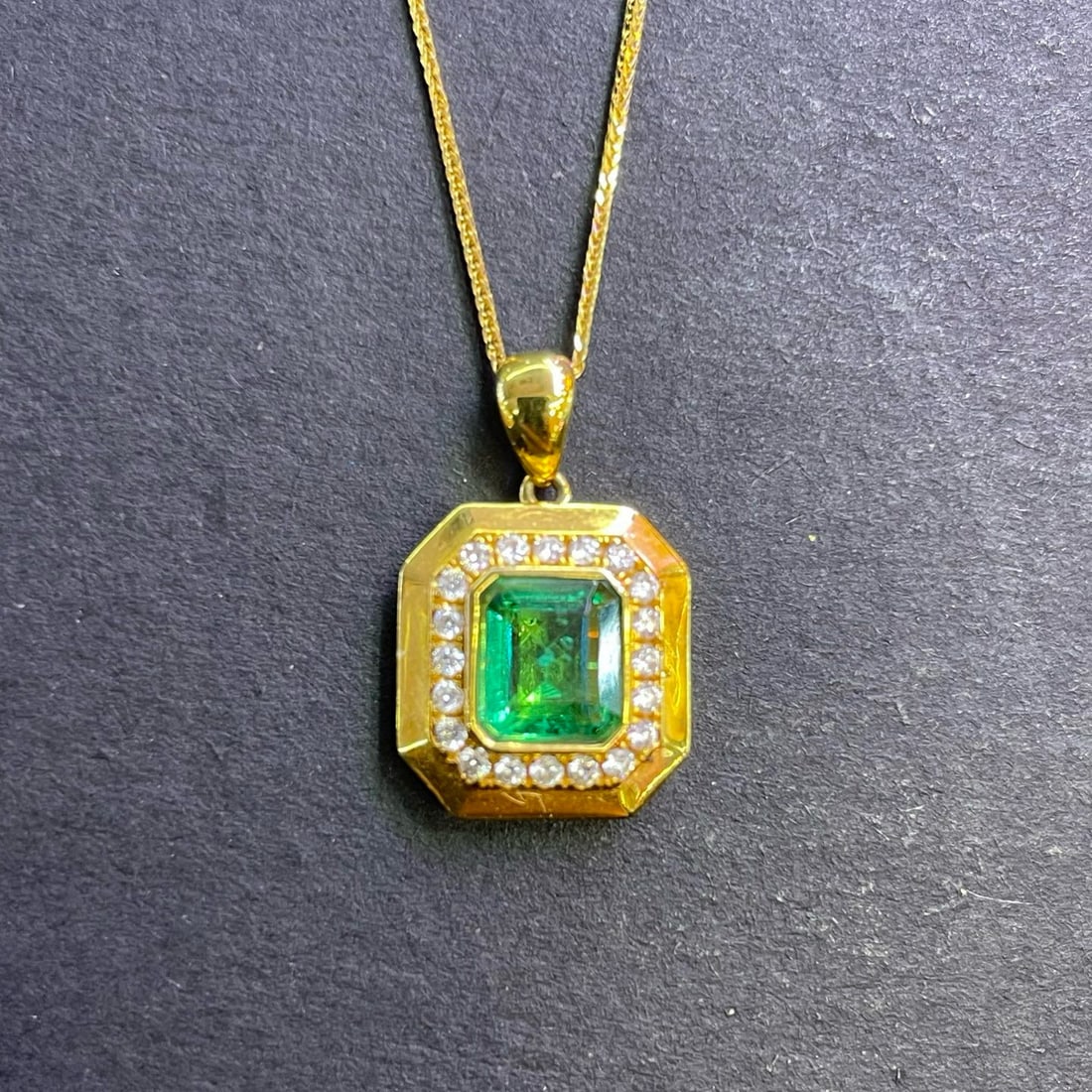 14k Gold 1.52 Ctw Natural Emerald & Diamond Pendant( Without Chain ): Ref:231019227 // gold content:14k gold // main gemstone:emerald // shape:octagonal // carat weight:1. 32ct // color:green // treatment:natural // // adjacent gemstone 2 : diamond // shape:round //
