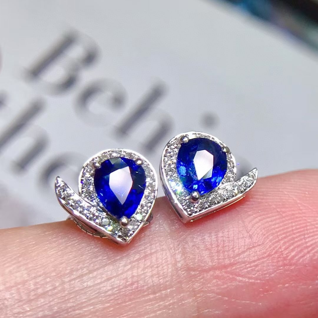 14k Gold 1.55 Ctw Natural Sapphire & Diamond Earrings: Ref:231019238 // gold content:14k gold // main gemstone:sapphire // shape:pear // carat weight:1. 35ct // color:blue // treatment:natural // // adjacent gemstone 2 : diamond // shape:round // carat