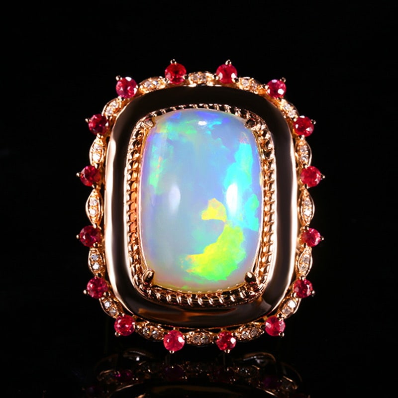 14k Gold 13.19 Ctw Natural Opal & Diamond Ring: Ref:231020001 // gold content:14k gold // ring size:7. 25us // // main gemstone:opal // shape:cushion // carat weight:13. 10ct // color:white // treatment:natural // // adjacent gemstone 2 : diamond