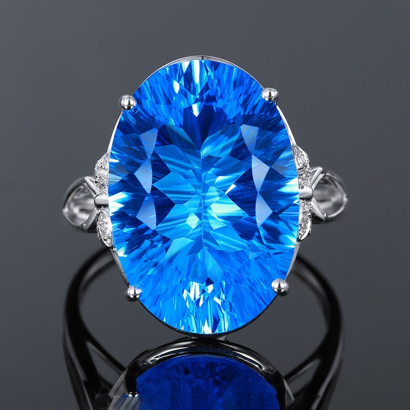 14k Gold 12.45 Ct Natural Topaz & Diamond Ring: Ref:231020011 // gold content:14k gold // ring size:7. 25us // // main gemstone:topaz // shape:oval // carat weight:12. 45ct // color:blue // treatment:natural // // adjacent gemstone 2 : diamond //