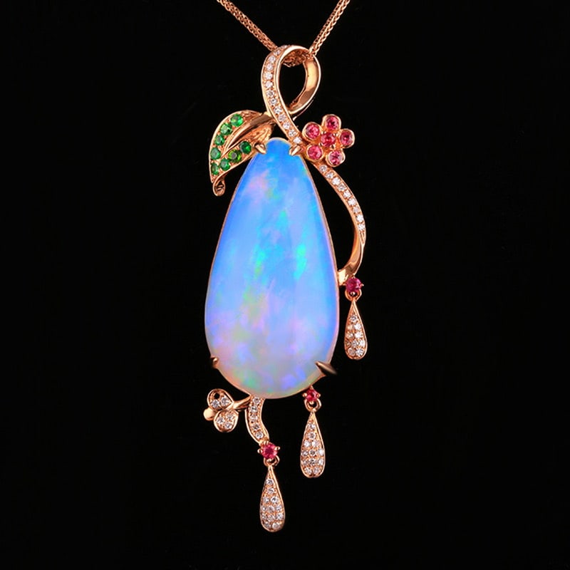 14k Gold 24.82 Ctw Natural Opal & Diamond Pendant( Without Chain ): Ref:231020028 // gold content:14k gold // main gemstone:opal // shape:pear // carat weight:24. 49ct // color:white // treatment:natural // // adjacent gemstone 2 : diamond // shape:round // carat