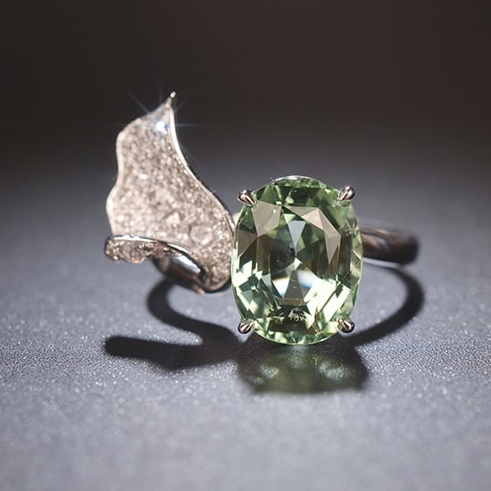 14k Gold 4.71 Ctw Natural Tourmaline & Diamond Ring: Ref:231020049 // gold content:14k gold // ring size:7. 25us // // main gemstone:tourmaline // shape:oval // carat weight:4. 35ct // color:green // treatment:natural // // adjacent gemstone 2 :