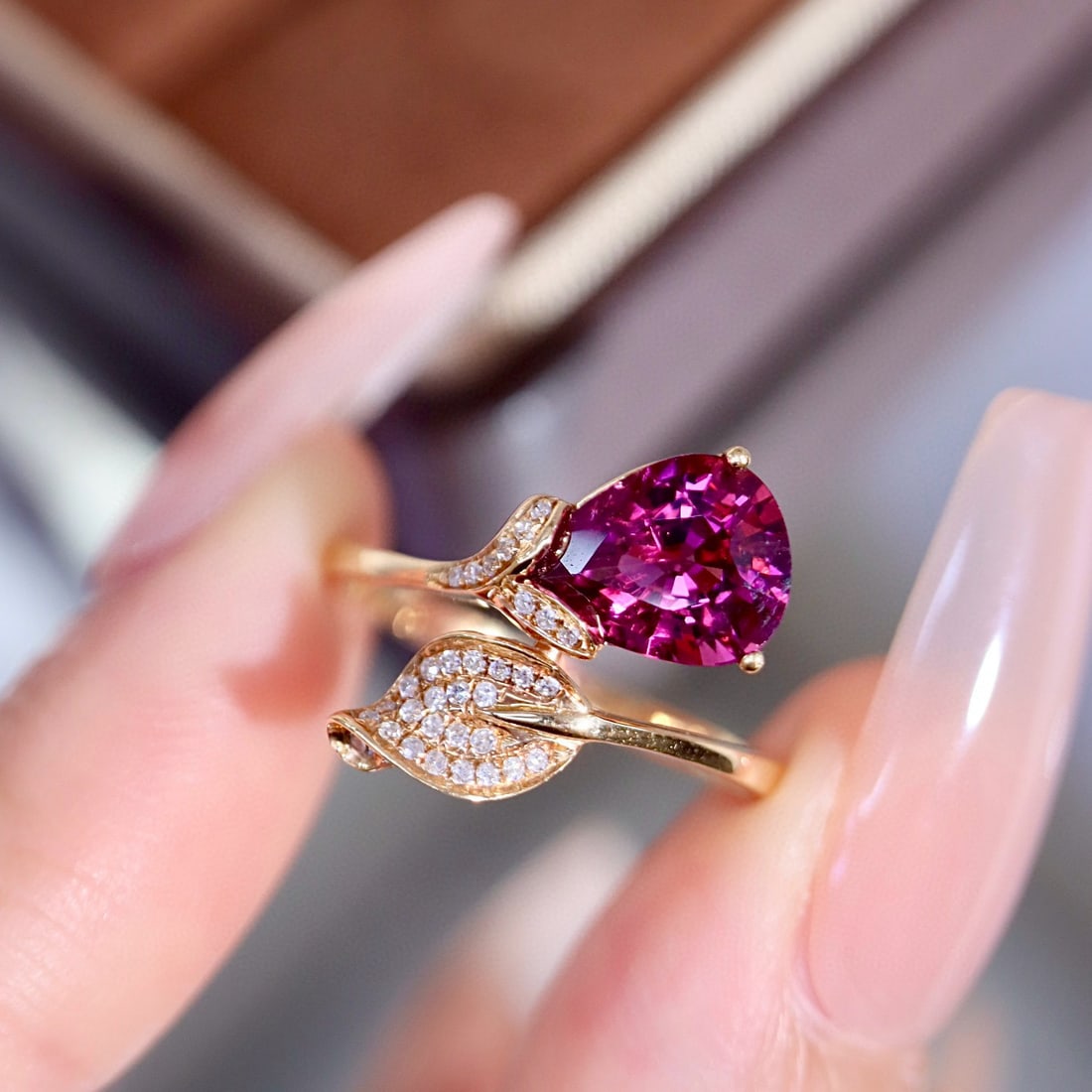14k Gold 1.73 Ct Natural Garnet & Diamond Ring: Ref:231020054 // gold content:14k gold // ring size:7. 25us // // main gemstone:garnet // shape:pear // carat weight:1. 73ct // color:purple // treatment:natural // // adjacent gemstone 2 : diamond