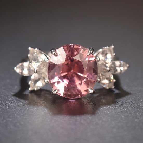 14k Gold 5.52 Ctw Natural Tourmaline & Sapphire Ring: Ref:231020073 // gold content:14k gold // ring size:7. 25us // // main gemstone:tourmaline // shape:oval // carat weight:4. 2ct // color:pink // treatment:natural // // adjacent gemstone 2 : sapphire 