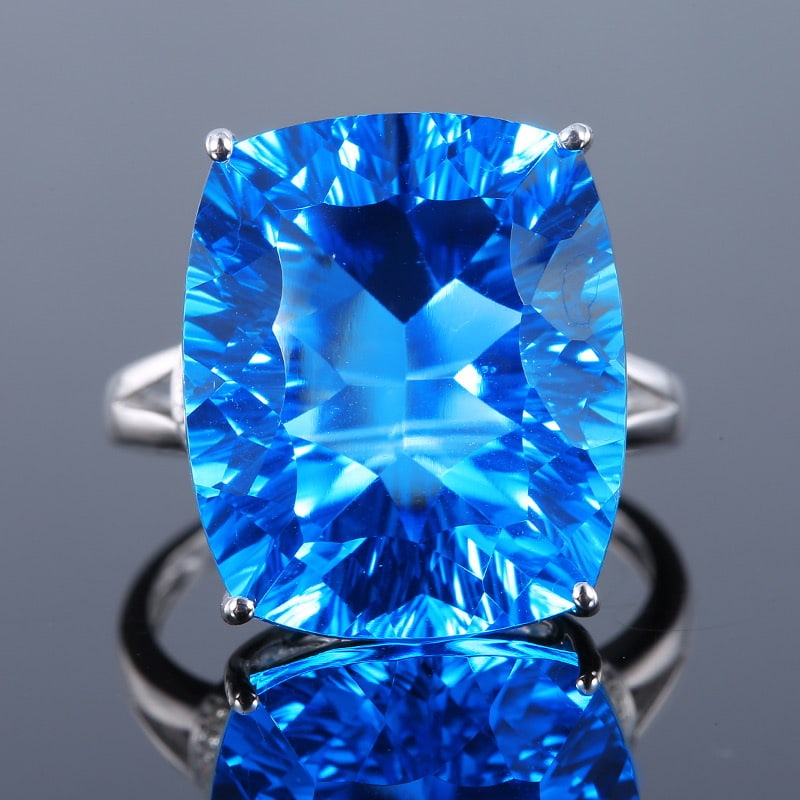 14k Gold 20.24 Ct Natural Topaz & Diamond Ring: Ref:231020104 // gold content:14k gold // ring size:7. 25us // // main gemstone:topaz // shape:cushion // carat weight:20. 24ct // color:blue // treatment:natural // // adjacent gemstone 2 : diamond /