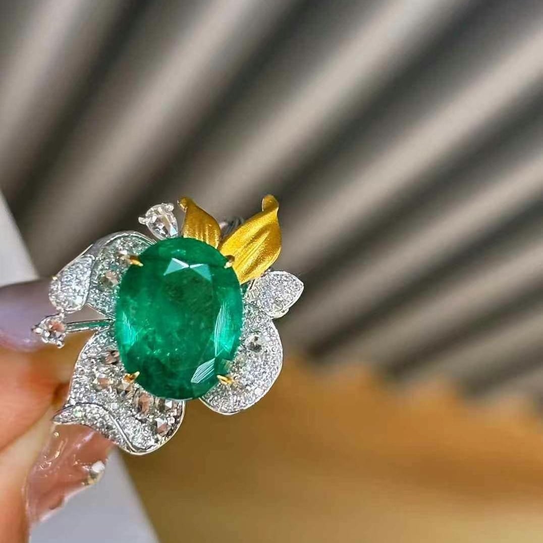 14k Gold 3.1 Ct Vivid Green Natural Emerald & Diamond & Sapphire Ring: Ref:231020107 // gold content:14k gold // ring size:7. 25us // // main gemstone:emerald // shape:oval // carat weight:3. 1ct // color:vivid green // treatment:natural // // adjacent gemstone 2 :