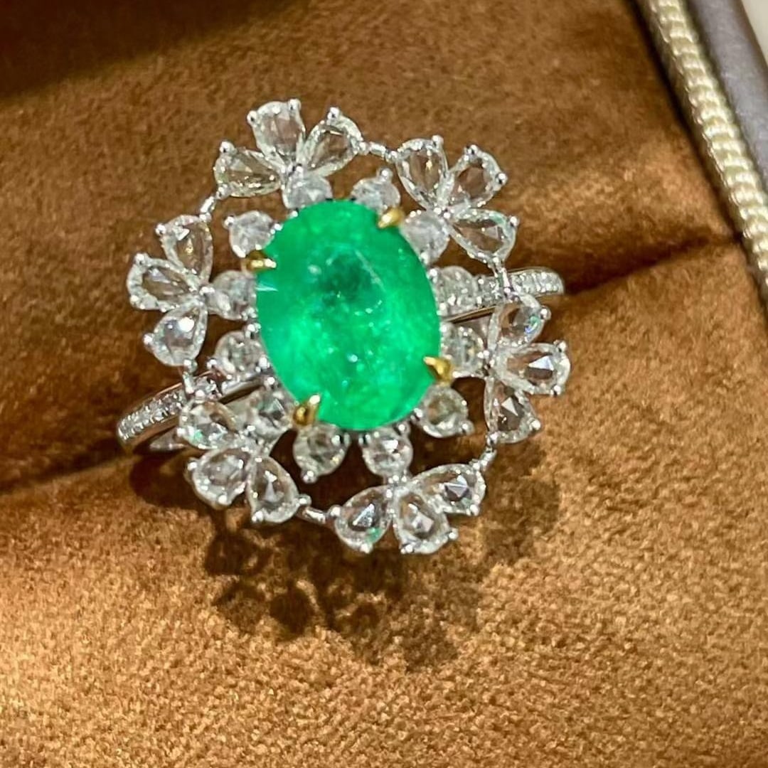 14k Gold 1.5 Ct Natural Emerald & Diamond Ring: Ref:231020113 // gold content:14k gold // ring size:7. 25us // // main gemstone:emerald // shape:oval // carat weight:1. 5ct // color:green // treatment:natural // // adjacent gemstone 2 : diamond //