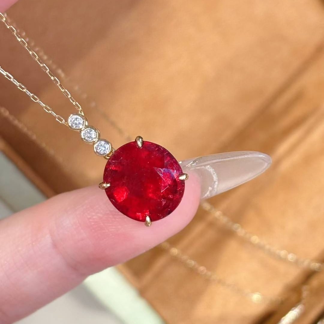14k Gold 3.52 Ct Natural Tourmaline & Diamond Pendant( Without Chain ): Ref:231020119 // gold content:14k gold // main gemstone:tourmaline // shape:oval // carat weight:3. 52ct // color:red // treatment:natural // // adjacent gemstone 2 : diamond // shape:round //