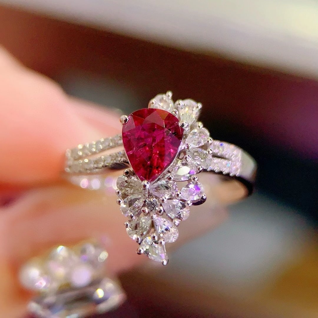 14k Gold 0.75 Ct Natural Tourmaline & Diamond Ring: Ref:231020122 // gold content:14k gold // ring size:7. 25us // // main gemstone:tourmaline // shape:pear // carat weight:0. 75ct // color:red // treatment:natural // // adjacent gemstone 2 : diamond