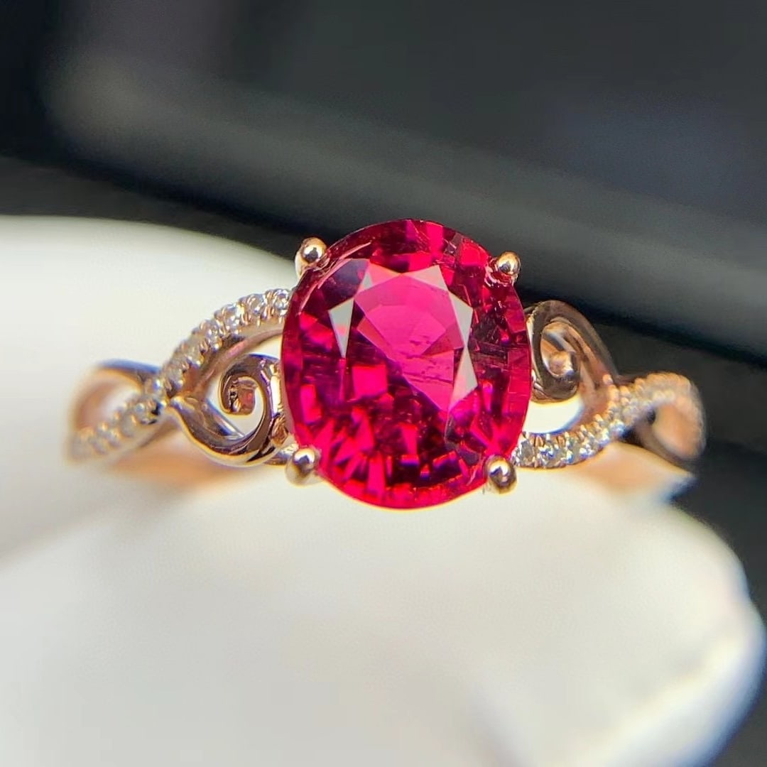 14k Gold 1.58 Ct Natural Tourmaline & Diamond Ring: Ref:231020127 // gold content:14k gold // ring size:7. 25us // // main gemstone:tourmaline // shape:oval // carat weight:1. 58ct // color:red // treatment:natural // // adjacent gemstone 2 : diamond