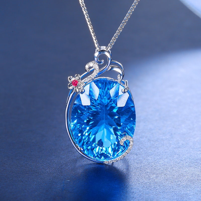 14k Gold 22.02 Ct Natural Topaz & Diamond & Ruby Pendant( Without Chain ): Ref:231020163 // gold content:14k gold // main gemstone:topaz // shape:oval // carat weight:22. 02ct // color:blue // treatment:natural // // adjacent gemstone 2 : diamond // shape:round // clarity