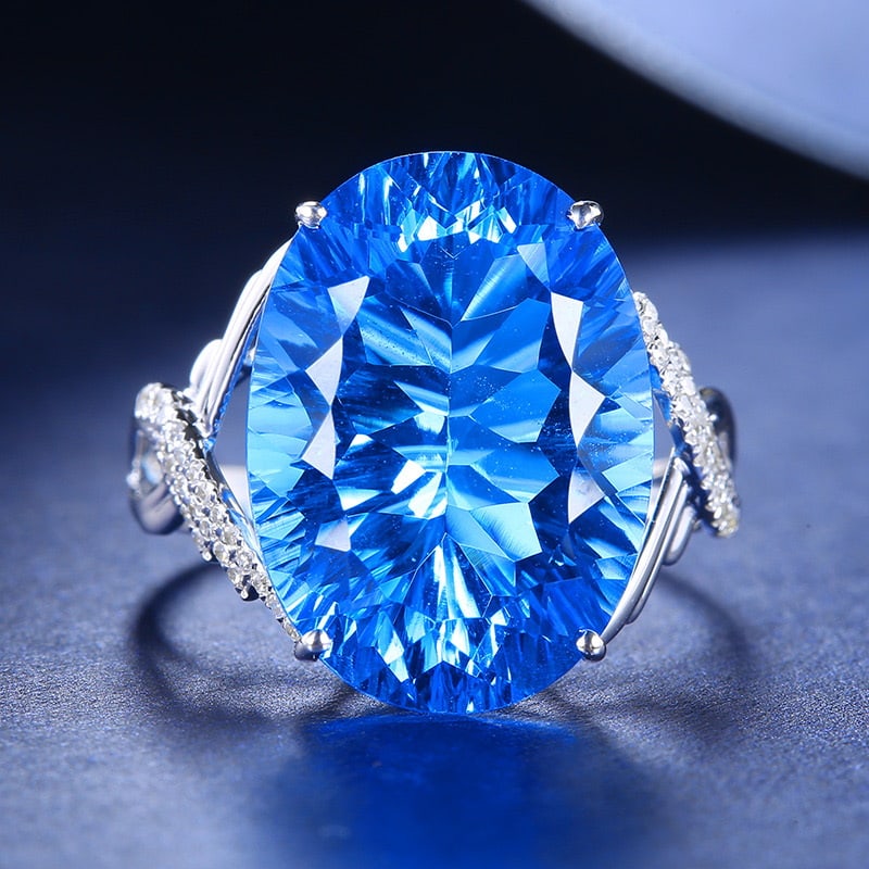 14k Gold 13.47 Ct Natural Topaz & Diamond Ring: Ref:231020166 // gold content:14k gold // ring size:7. 25us // // main gemstone:topaz // shape:oval // carat weight:13. 47ct // color:blue // treatment:natural // // adjacent gemstone 2 : diamond //