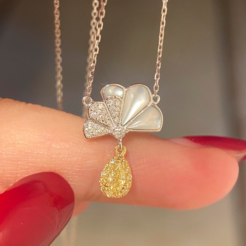 14k Gold 0.38 Ctw Natural Yellow Diamond & Diamond Necklace: Ref:231020187 // gold content:14k gold // main gemstone:yellow diamond // shape:pear // carat weight:0. 20ct // color:yellow // treatment:natural // // adjacent gemstone 2 : diamond // shape:round //