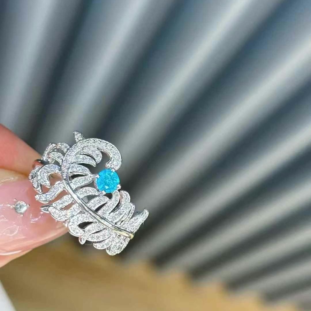 14k Gold 0.15 Ct Natural Paraiba Tourmaline & Diamond Ring: Ref:231020193 // gold content:14k gold // ring size:7. 25us // // main gemstone:paraiba tourmaline // shape:round // carat weight:0. 15ct // color:blue // treatment:natural // cut grade:g // //