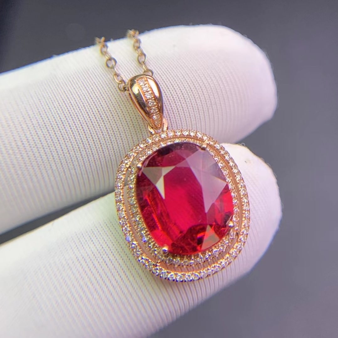 14k Gold 3.4 Ct Natural Tourmaline & Diamond Pendant( Without Chain ): Ref:231020194 // gold content:14k gold // main gemstone:tourmaline // shape:oval // carat weight:3. 4ct // color:red // treatment:natural // // adjacent gemstone 2 : diamond // shape:round // clarity 