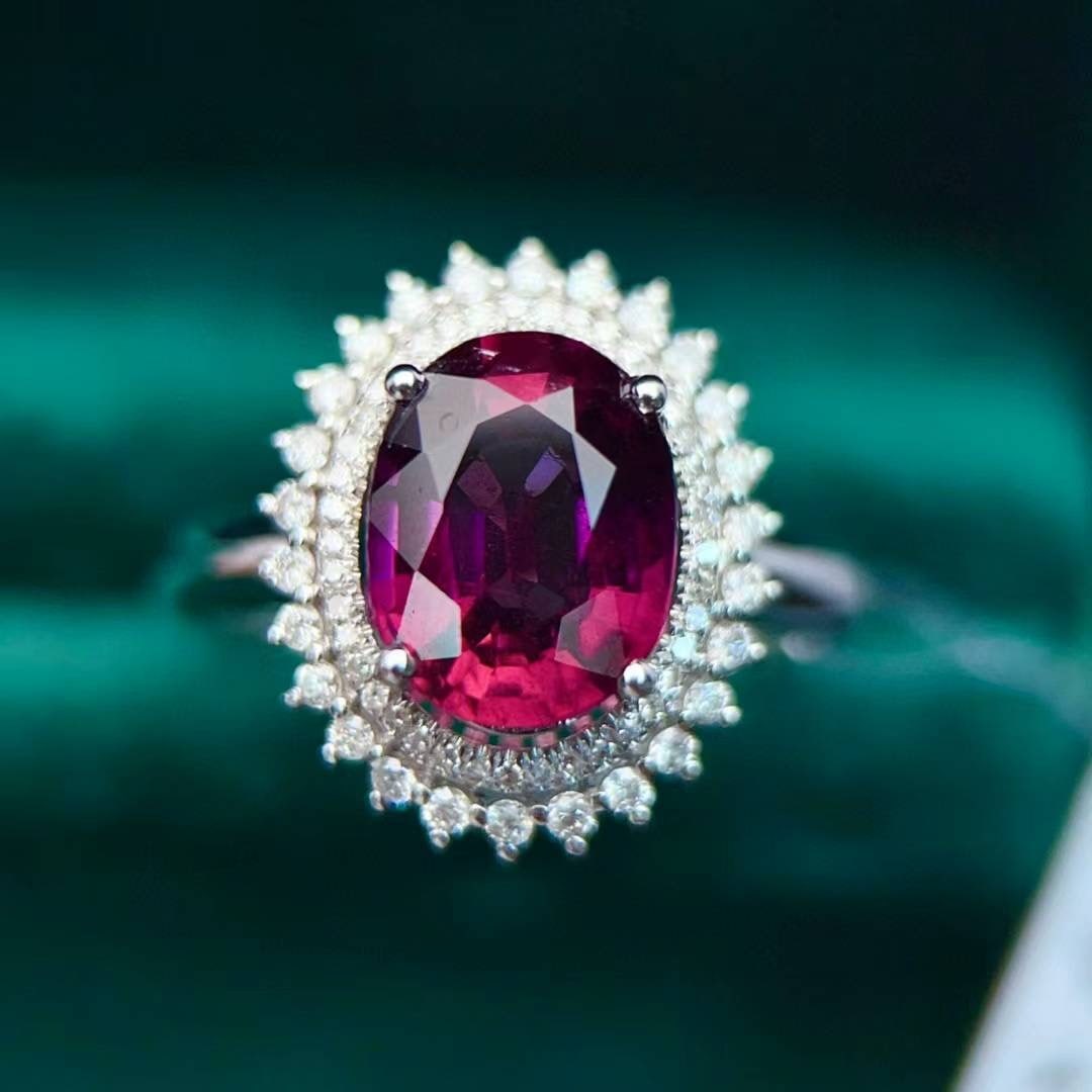 14k Gold 2.4 Ct Natural Tourmaline & Diamond Ring: Ref:231020195 // gold content:14k gold // ring size:7. 25us // // main gemstone:tourmaline // shape:oval // carat weight:2. 4ct // color:red // treatment:natural // // adjacent gemstone 2 : diamond