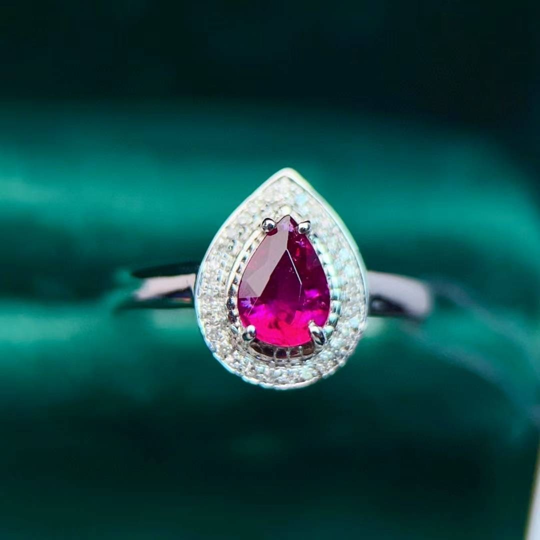 14k Gold 0.68 Ctw Natural Tourmaline & Diamond Ring: Ref:231020197 // gold content:14k gold // ring size:7. 25us // // main gemstone:tourmaline // shape:pear // carat weight:0. 6ct // color:red // treatment:natural // // adjacent gemstone 2 : diamond