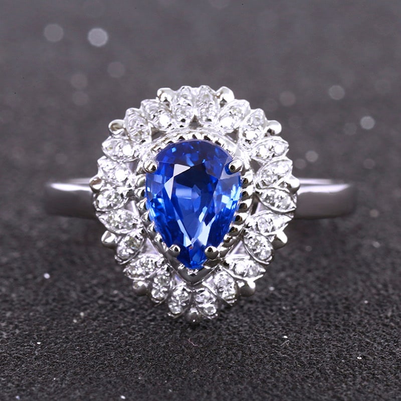 14k Gold 1.58 Ctw Natural Sapphire & Diamond Ring: Ref:231020210 // gold content:14k gold // ring size:7. 25us // // main gemstone:sapphire // shape:pear // carat weight:1. 45ct // color:blue // treatment:natural // // adjacent gemstone 2 : diamond