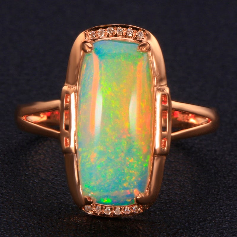 14k Gold 2.45 Ctw Natural Opal & Diamond Ring: Ref:231020228 // gold content:14k gold // ring size:7. 25us // // main gemstone:opal // shape:cushion // carat weight:2. 42ct // color:color // treatment:natural // // adjacent gemstone 2 : diamond
