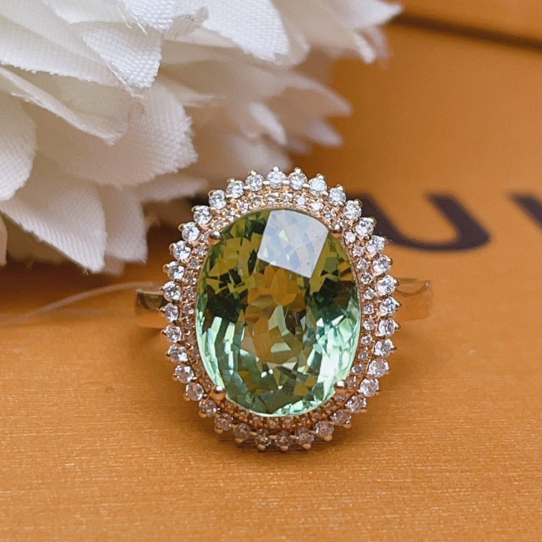 14k Gold 5.2 Ct Natural Tourmaline & Diamond Ring: Ref:231020233 // gold content:14k gold // ring size:7. 25us // // main gemstone:tourmaline // shape:oval // carat weight:5. 2ct // color:green // treatment:natural // // adjacent gemstone 2 : diamond