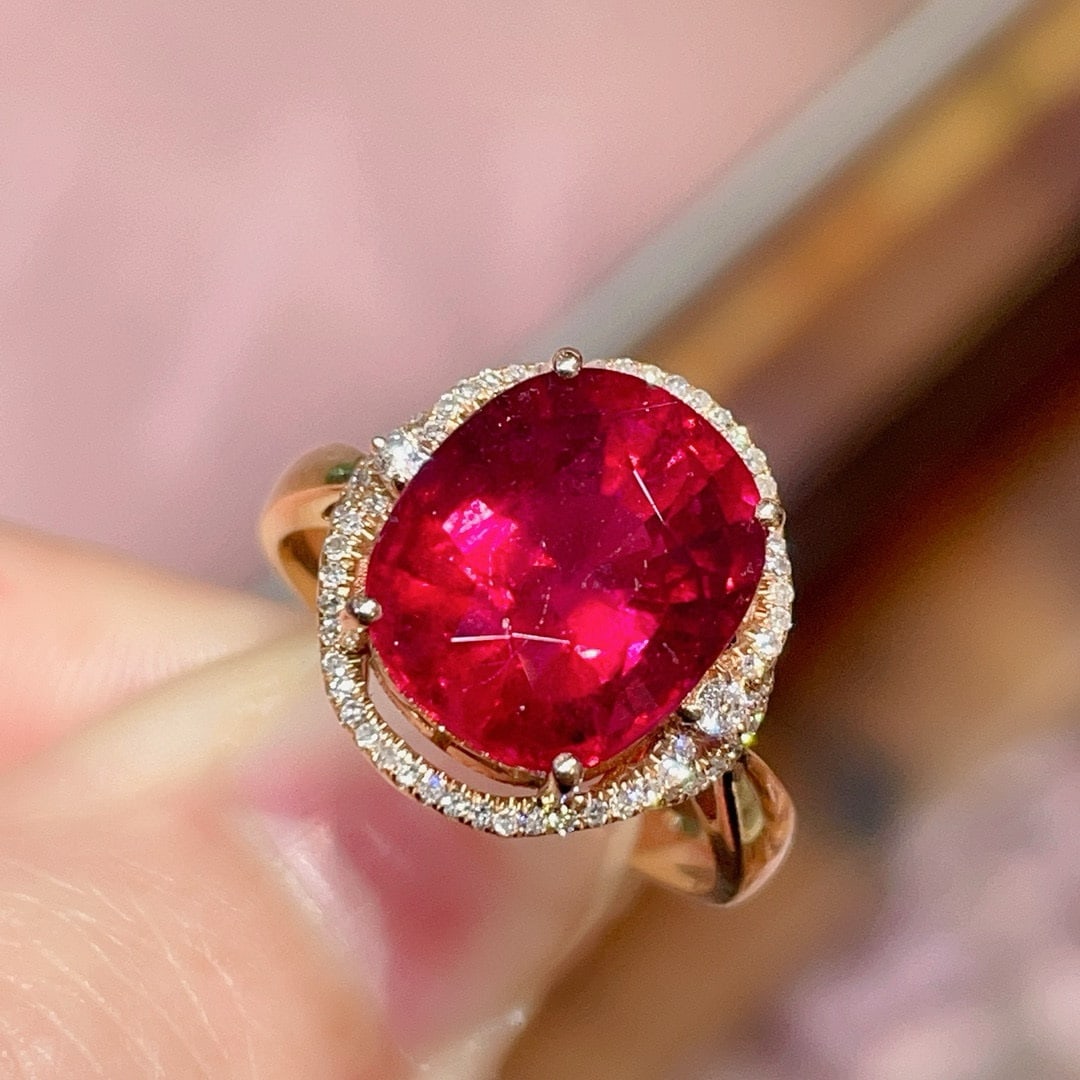 14k Gold 5.8 Ct Natural Tourmaline & Diamond Ring: Ref:231020234 // gold content:14k gold // ring size:7. 25us // // main gemstone:tourmaline // shape:oval // carat weight:5. 8ct // color:red // treatment:natural // // adjacent gemstone 2 : diamond