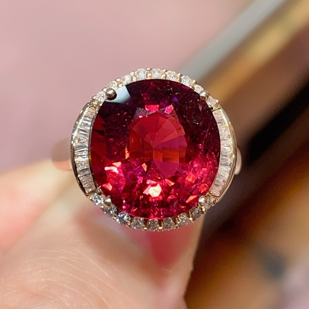 14k Gold 7.64 Ct Natural Tourmaline & Diamond Ring: Ref:231020254 // gold content:14k gold // ring size:7. 25us // // main gemstone:tourmaline // shape:oval // carat weight:7. 64ct // color:red // treatment:natural // // adjacent gemstone 2 : diamond