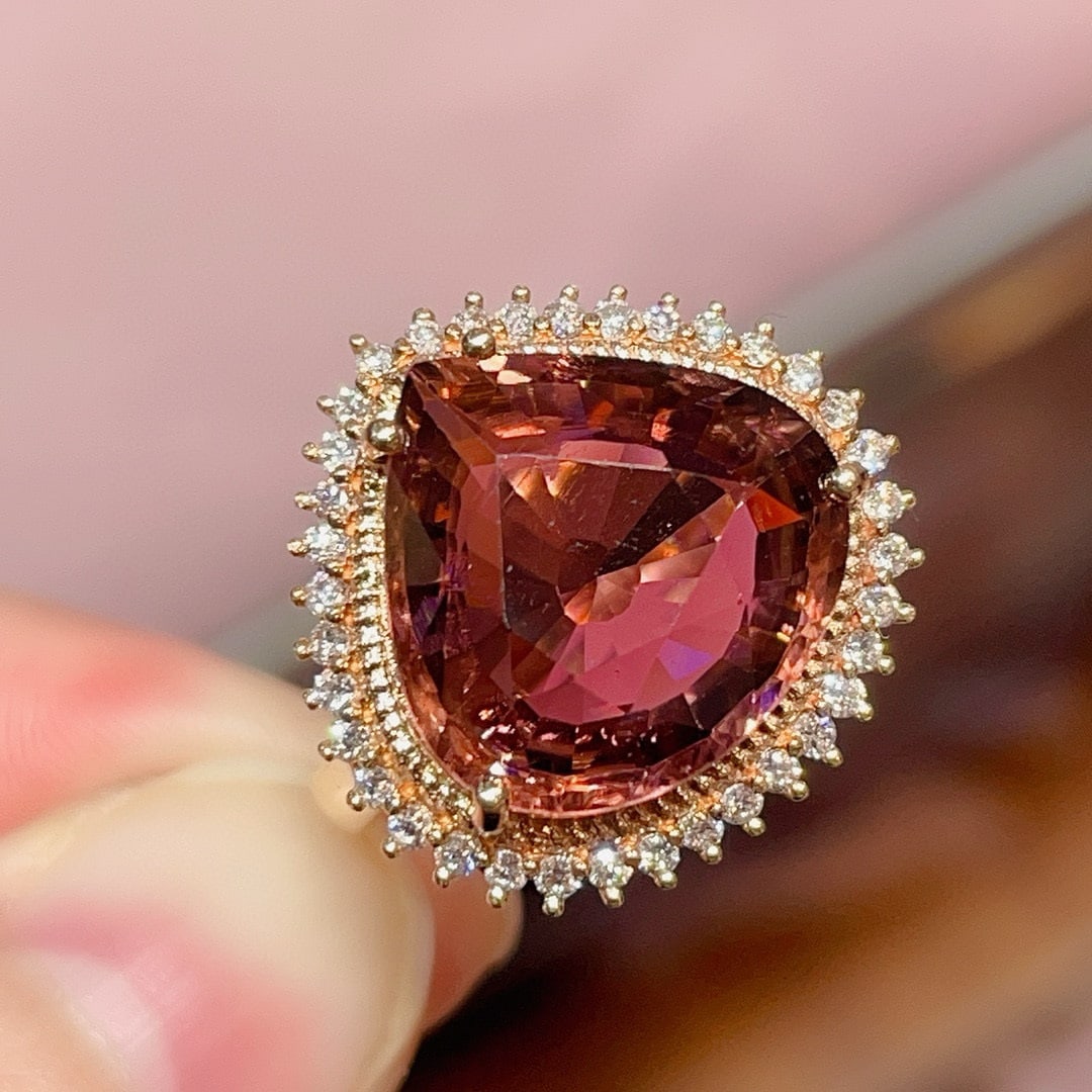 14k Gold 5.8 Ct Natural Tourmaline & Diamond Ring: Ref:231020255 // gold content:14k gold // ring size:7. 25us // // main gemstone:tourmaline // shape:pear // carat weight:5. 8ct // color:red // treatment:natural // // adjacent gemstone 2 : diamond