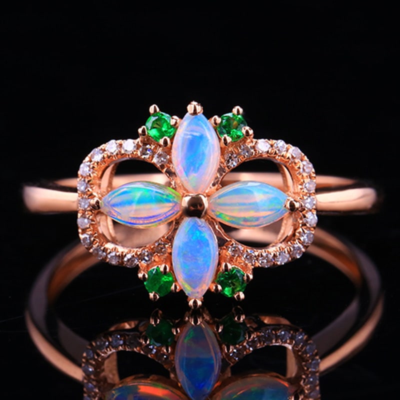 14k Gold 0.42 Ctw Natural Opal & Diamond Ring: Ref:231020272 // gold content:14k gold // ring size:7. 25us // // main gemstone:opal // shape:marquise // carat weight:0. 33ct // color:white // treatment:natural // // adjacent gemstone 2 : diamond