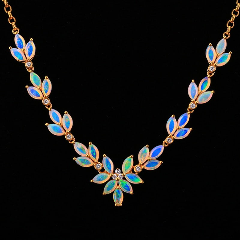 14k Gold 2.6 Ct Natural Opal & Diamond Necklace: Ref:231020273 // gold content:14k gold // main gemstone:opal // shape:marquise // carat weight:2. 6ct // color:white // treatment:natural // // adjacent gemstone 2 : diamond // shape:round // clarity
