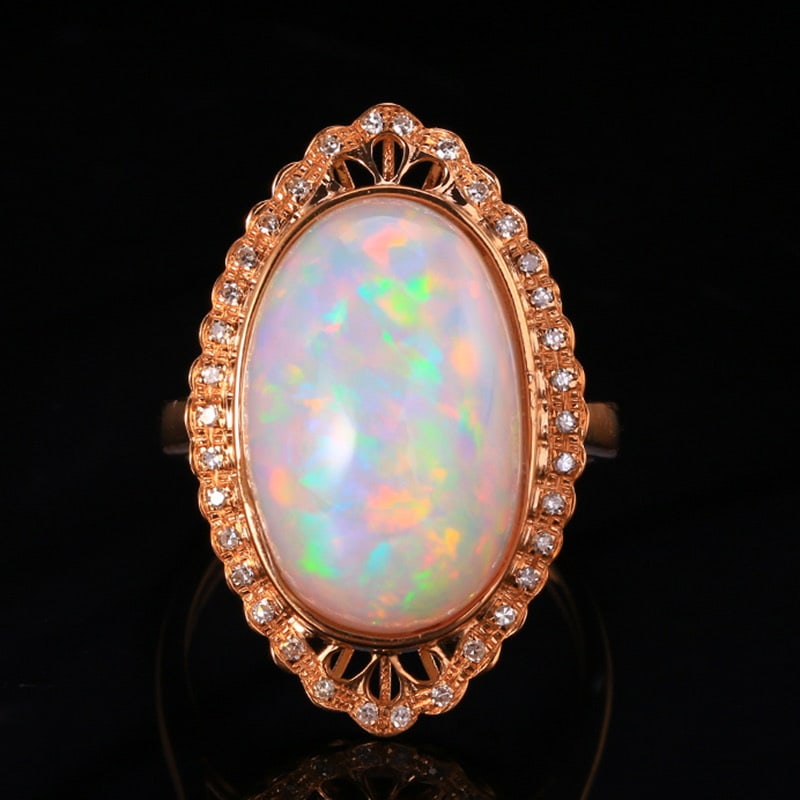 14k Gold 11.19 Ctw Natural Opal & Diamond Ring: Ref:231020274 // gold content:14k gold // ring size:7. 25us // // main gemstone:opal // shape:oval // carat weight:11. 02ct // color:white // treatment:natural // // adjacent gemstone 2 : diamond //