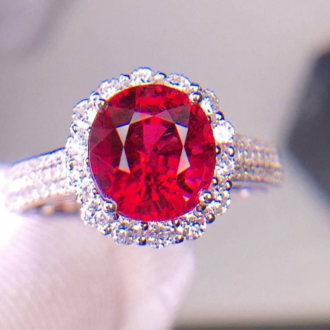 14k Gold 2.6 Ct Natural Tourmaline & Diamond Ring: Ref:231020279 // gold content:14k gold // ring size:7. 25us // // main gemstone:tourmaline // shape:oval // carat weight:2. 6ct // color:red // treatment:natural // // adjacent gemstone 2 : diamond