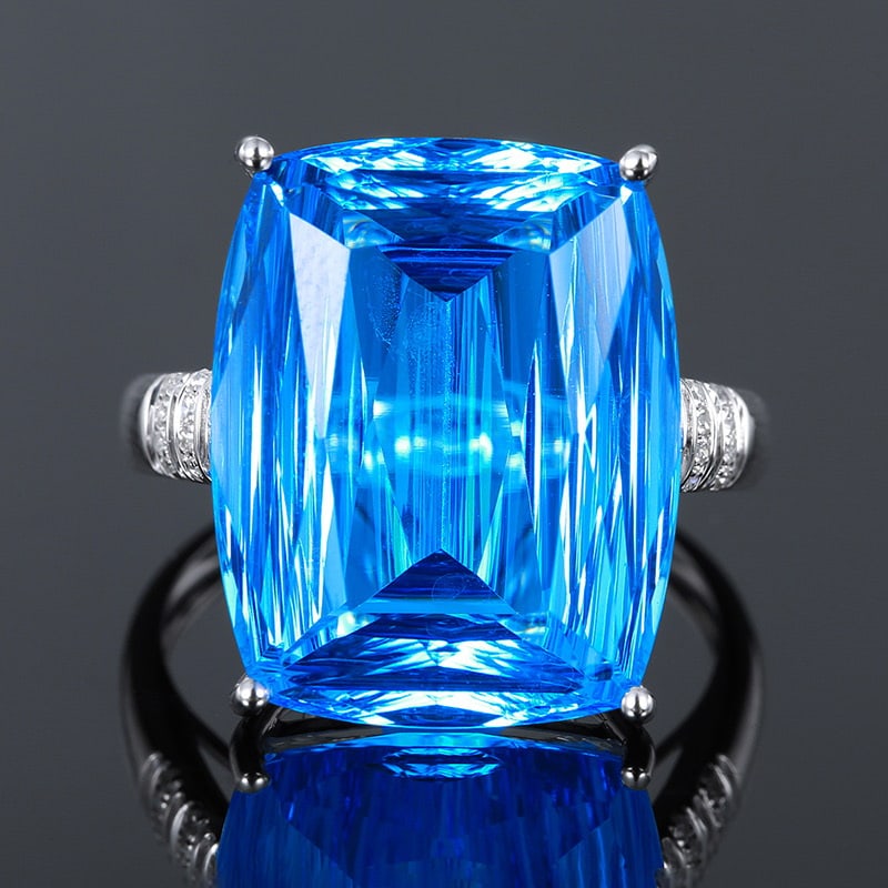 14k Gold 15.5 Ct Natural Topaz & Diamond Ring: Ref:231020301 // gold content:14k gold // ring size:7. 25us // // main gemstone:topaz // shape:cushion // carat weight:15. 5ct // color:blue // treatment:natural // // adjacent gemstone 2 : diamond