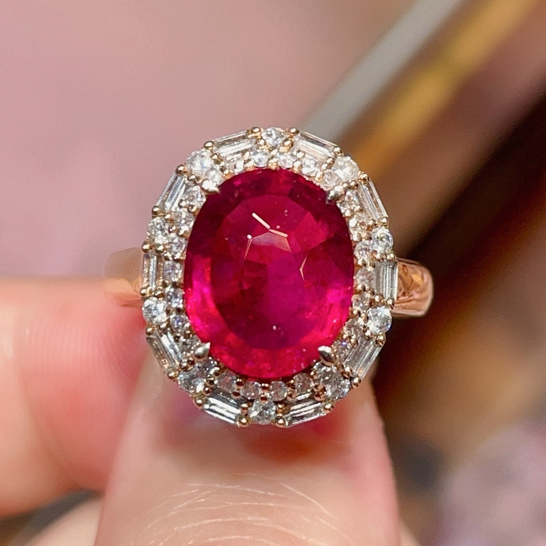 14k Gold 3.8 Ct Natural Tourmaline & Diamond Ring: Ref:231020313 // gold content:14k gold // ring size:7. 25us // // main gemstone:tourmaline // shape:oval // carat weight:3. 8ct // color:red // treatment:natural // // adjacent gemstone 2 : diamond //