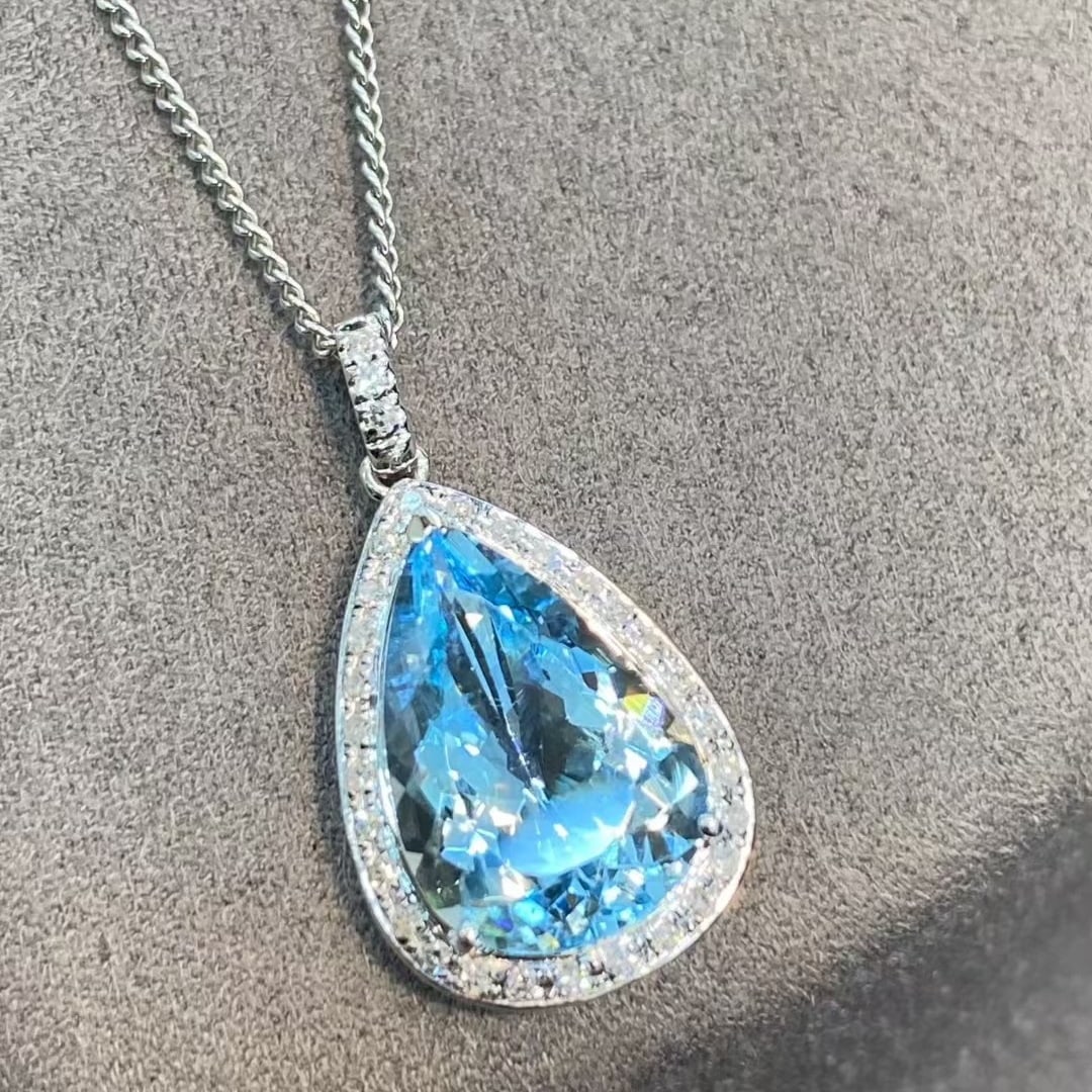 14k Gold 2.85 Ct Natural Aquamarine & Diamond Necklace: Ref:231020317 // gold content:14k gold // main gemstone:aquamarine // shape:pear // carat weight:2. 85ct // color:santa maria color // treatment:natural // // adjacent gemstone 2 : diamond // number o