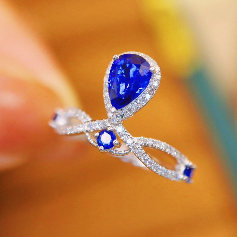 14k Gold 1.09 Ctw Natural Sapphire & Sapphire Ring: Ref:231020329 // gold content:14k gold // ring size:7. 25us // // main gemstone:sapphire // shape:pear // carat weight:0. 9ct // color:royal blue // treatment:natural // // adjacent gemstone 2 :