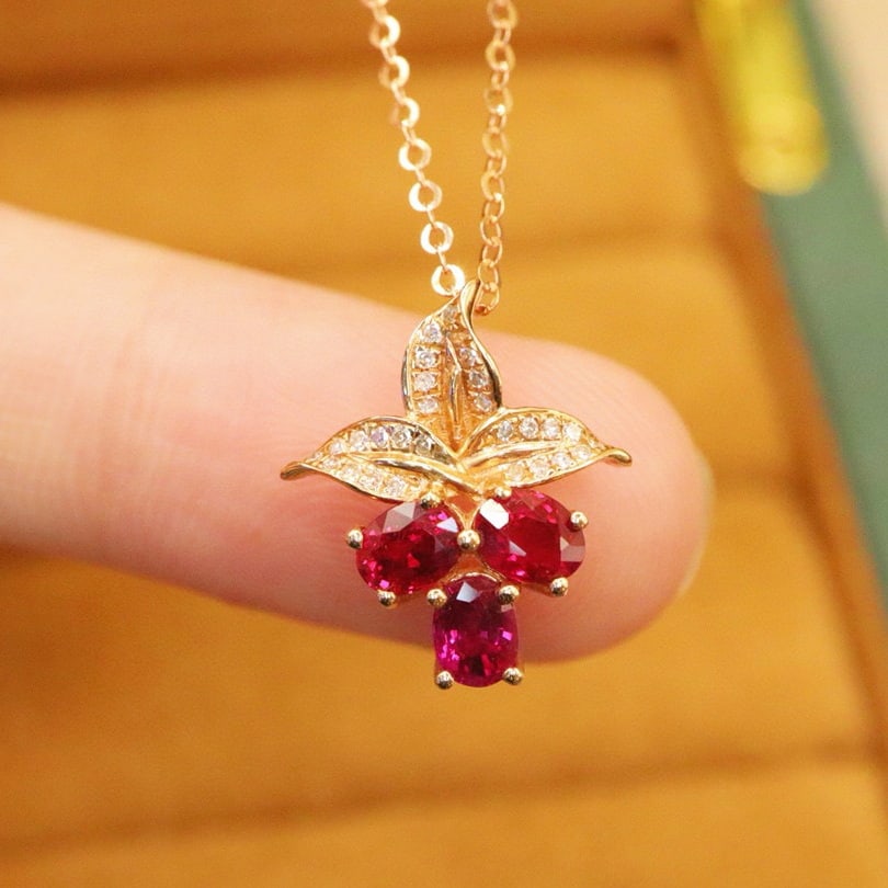14k Gold 1.16 Ctw Natural Ruby & Diamond Pendant( Without Chain ): Ref:231020337 // gold content:14k gold // main gemstone:ruby // shape:oval // carat weight:1. 08ct // color:red // treatment:natural // // adjacent gemstone 2 : diamond // number of stones:28 //