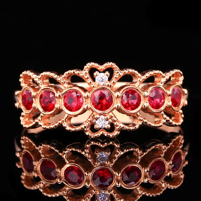 14k Gold 0.54 Ctw Natural Ruby & Diamond Ring: Ref:231020343 // gold content:14k gold // ring size:7. 25us // // main gemstone:ruby // shape:round // carat weight:0. 52ct // color:red // treatment:natural // cut grade:g // // adjacent gemstone 2