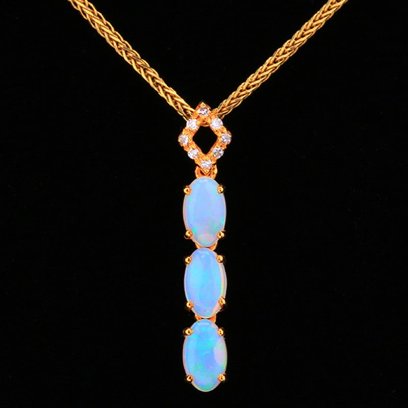 14k Gold 0.5 Ct Natural Opal & Diamond Pendant( Without Chain ): Ref:231020358 // gold content:14k gold // main gemstone:opal // shape:oval // carat weight:0. 5ct // color:white // treatment:natural // // adjacent gemstone 2 : diamond // shape:round // clarity