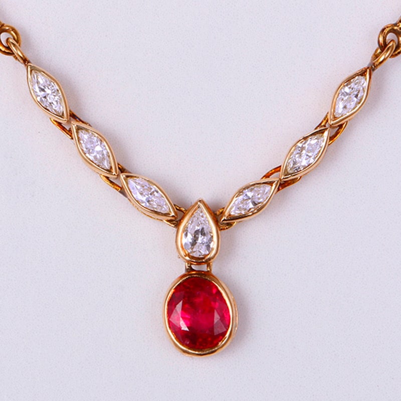 14k Gold 1.02 Ctw Natural Ruby & Diamond Necklace: Ref:231020362 // gold content:14k gold // main gemstone:ruby // shape:oval // carat weight:0. 62ct // color:red // treatment:natural // // adjacent gemstone 2 : diamond // shape:multiply // carat