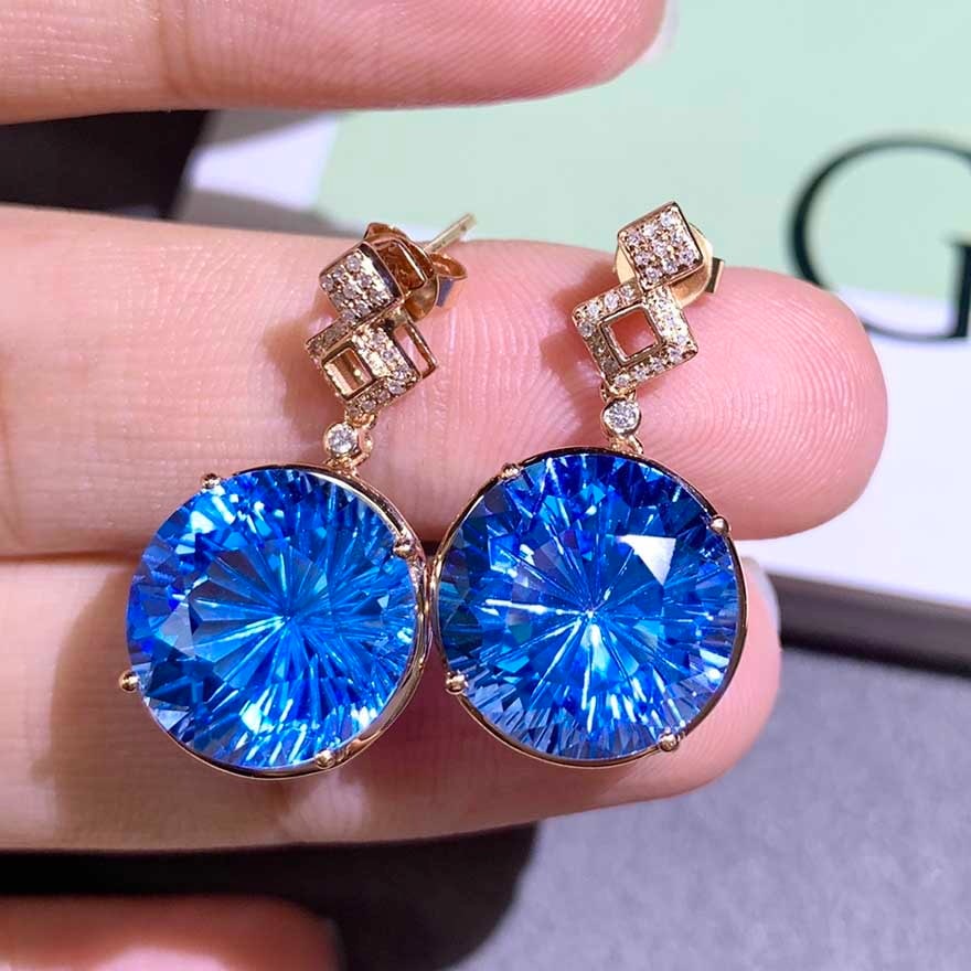 14k Gold 19 Ct Natural Topaz & Diamond Earrings: Ref:231020399 // gold content:14k gold // main gemstone:topaz // shape:round // carat weight:19ct // color:blue // treatment:natural // cut grade:g // // adjacent gemstone 2 : diamond // shape:round /