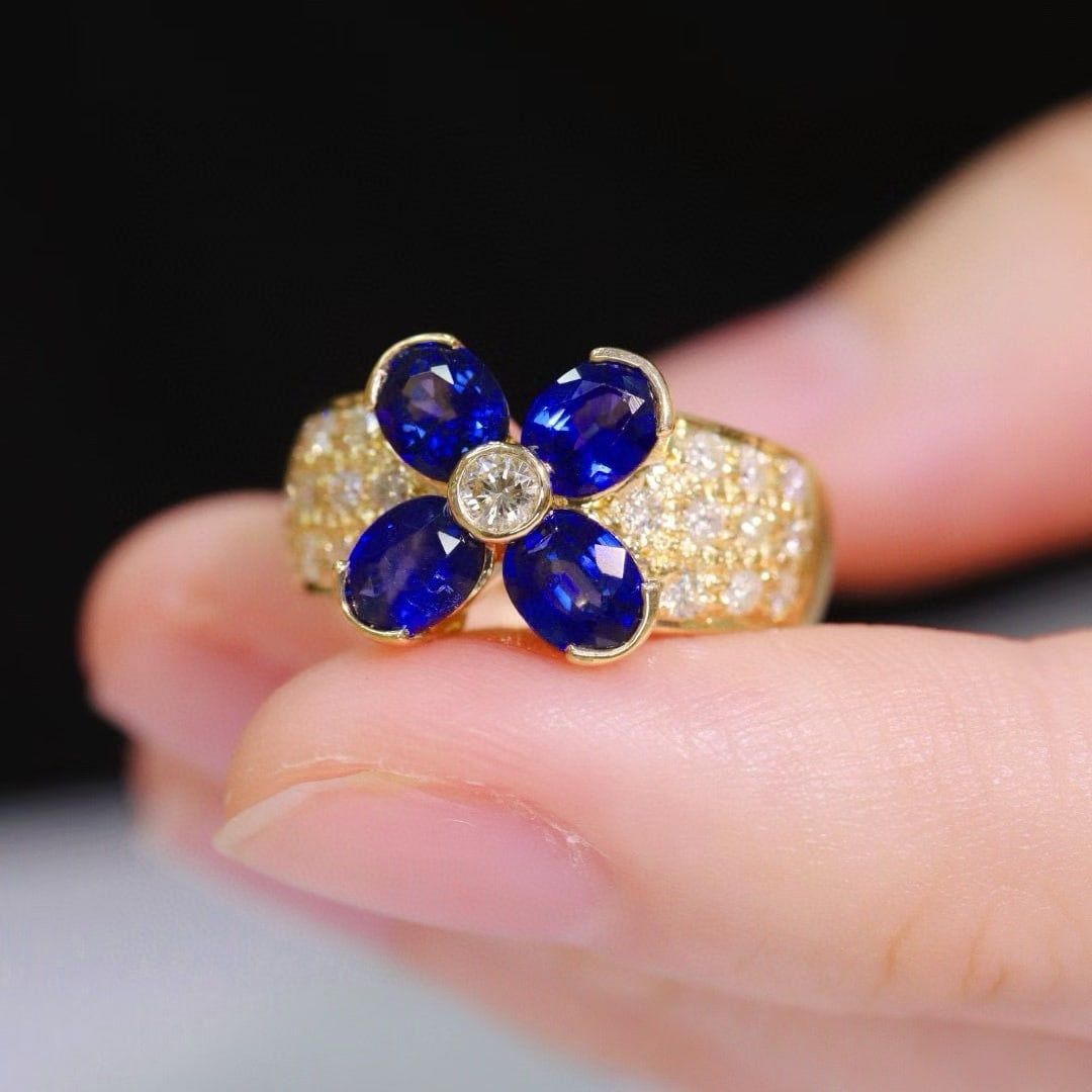 14k Gold 2.03 Ctw Vivid Blue Natural Sapphire & Diamond Ring: Ref:231020406 // gold content:14k gold // ring size:7. 25us // // main gemstone:sapphire // shape:oval // carat weight:1. 66ct // color:vivid blue // treatment:natural // // adjacent gemstone 2 :