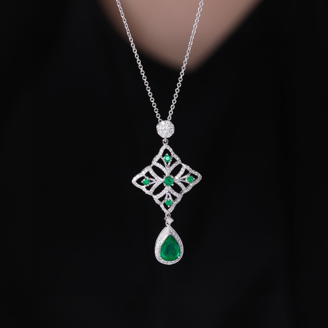 14k Gold 1.85 Ctw Vivid Green Natural Emerald & Diamond Pendant( Without Chain ): Ref:231020420 // gold content:14k gold // main gemstone:emerald // shape:pear // carat weight:1. 16ct // color:vivid green // treatment:natural // // adjacent gemstone 2 : diamond // shape:round //
